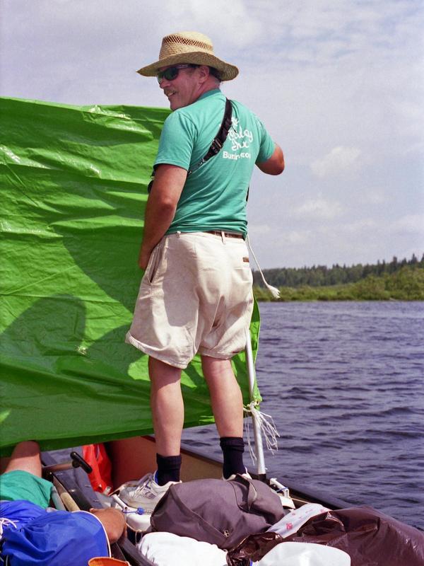 George plays navigator as we sail down Long Lake on the Allagash Wilderness Waterway in northern Maine