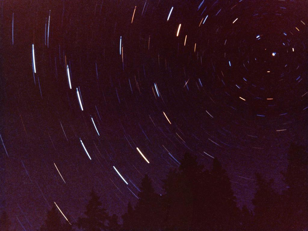 long-exposure star-tracks photo from Round Pond on the Allagash Wilderness Waterway in northern Maine