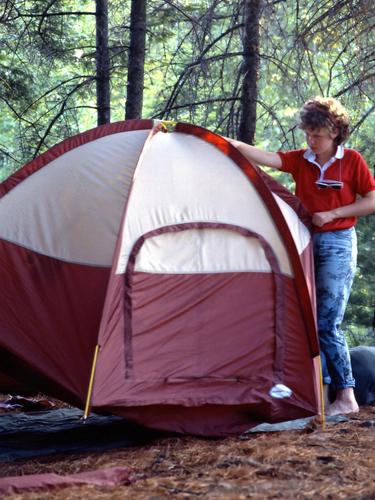 Heather sets up a tent at one of our overnight campsites on the Allagash Wilderness Waterway in northern Maine