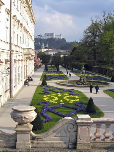 distant Salzburg Castle as viewed from Mirabell Palace in Austria