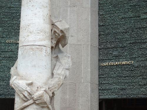 a modern-art statue of Jesus outside the Sagrada Familia church at Barcelona in Spain