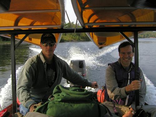 canoeists on a tow boat at Quetico Park in Ontario, Canada, in September 2003