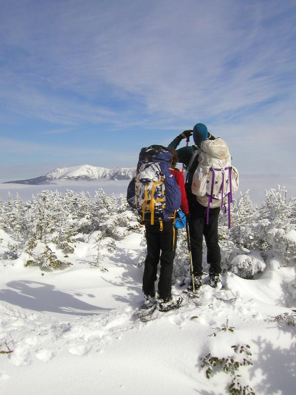 Mount Lafayette and undercast clouds as seen from South Kinsman Mountain in winter