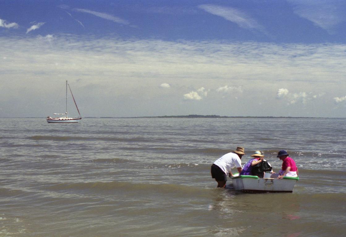 going by dinghy from motor-sailor to beach on the Georgia Coast in April 1990