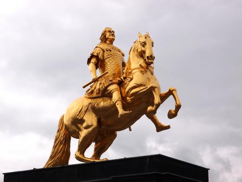 golden statue in the New City Market of Dresden in Germany