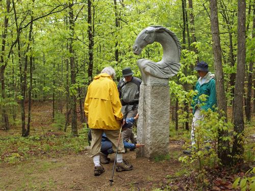 visitors at an outdoor exhibit at Andres Institute of Art in New Hampshire