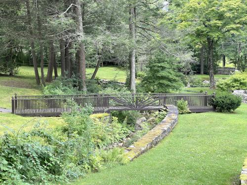 footbridge in August at Ashintully Gardens in western MA