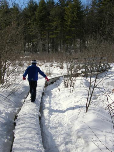 boardwalk during winter over Beaver Brook in New Hampshire