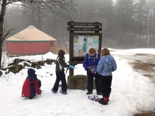 visitors by the yurt at Beaver Brook in New Hampshire