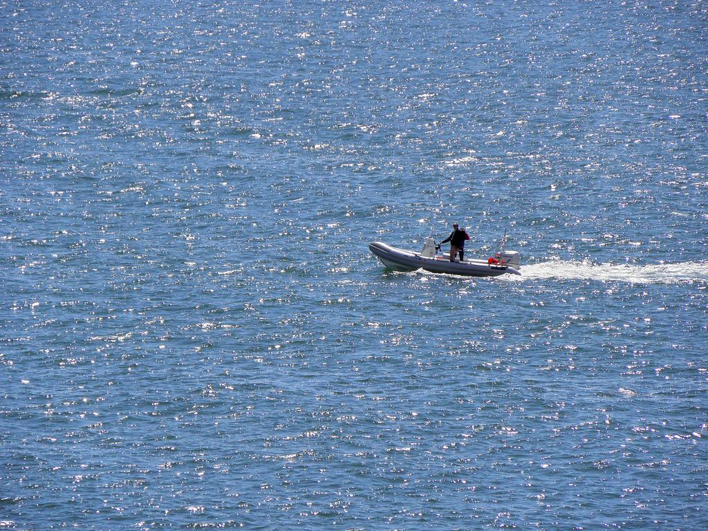 boaters enjoying beautiful weather near Spectacle Island at Boston Harbor in Massachusetts