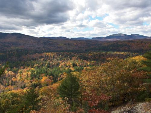 view west in October toward the White Mountains of New Hampshire from Browns Ledge in western Maine