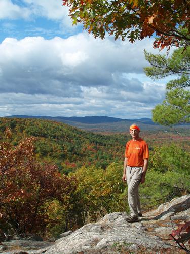 hiker on Burnt Meadow Mountain in Maine