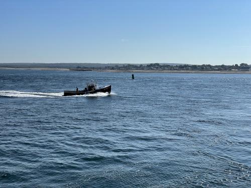 boat in October beside the Cape Cod Canal Bikeway in eastern Massachusetts