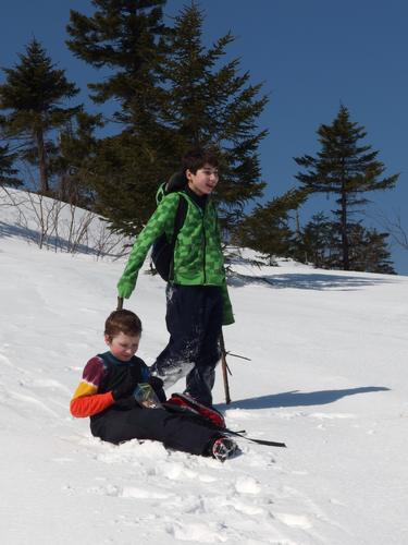 Carl and Anthony enjoy a sheltered break on Firescrew Mountain in New Hampshire