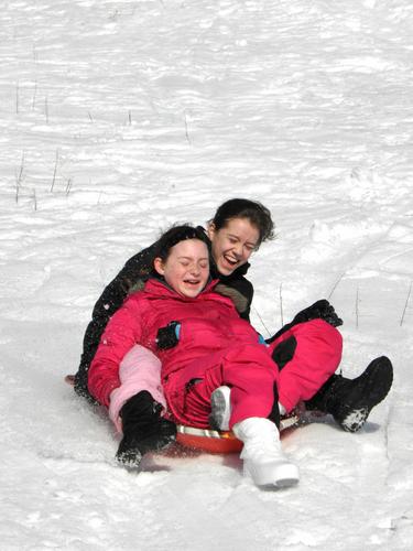 sledders near Cardigan Lodge in New Hampshire