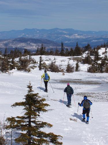 Dick, Kate and Dave head down the open ledges of Firescrew Mountain in New Hampshire