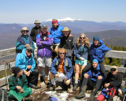 hikers on the summit tower of Mount Carrigain in New Hampshire