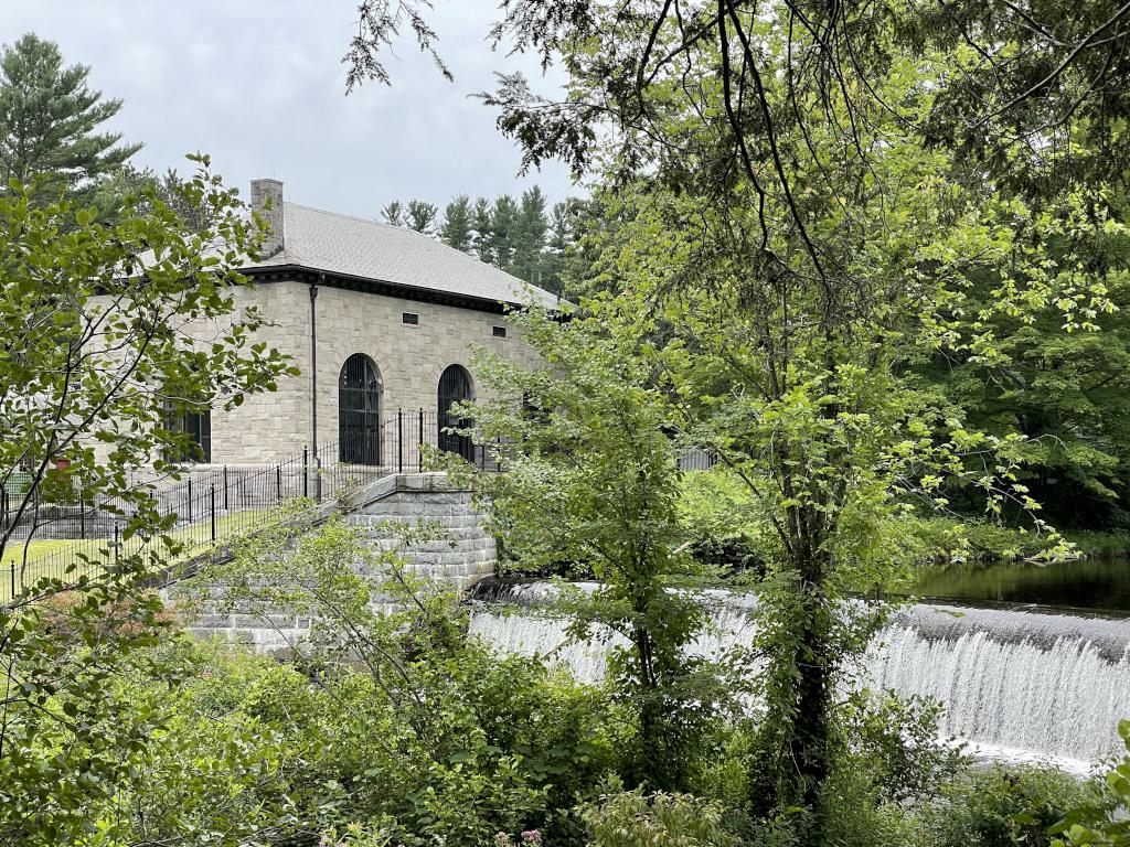 dam in August on the Quinepoxet River beside the Mass Central Rail Trail at Holden in eastern Massachusetts