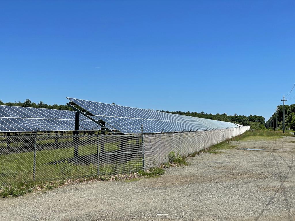 solar array in June beside the Ghost Trail near the Clipper City Trail at Newburyport in northeast Massachusetts