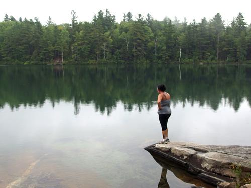 Sandra on a rocky point on Cole Pond in southwestern New Hampshire