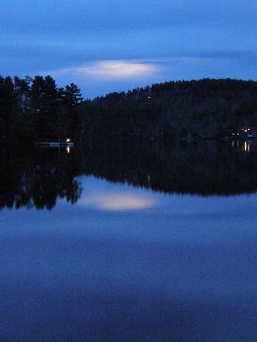 occluded moonrise over Cotton Cove in New Hampshire