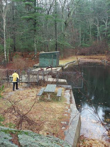 hiker at Deer Leap Natural Area in New Hampshire