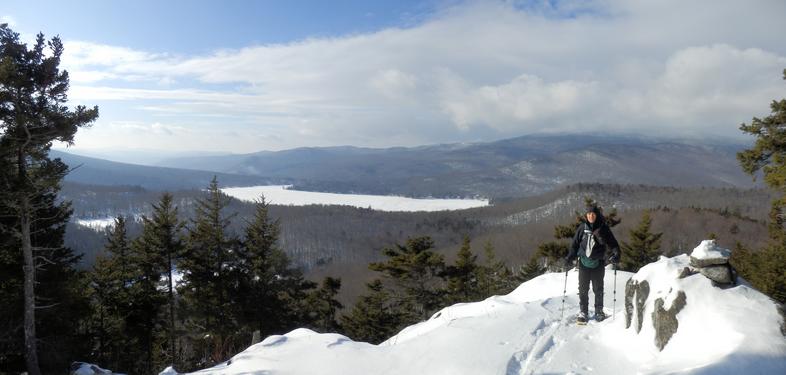 hiker at the lookout on Downing Mountain in New Hamsphrie