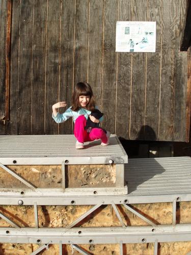 young visitor at the boathouse at East Boston Camps in Massachusetts