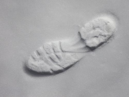 boot print in March on Eastview Rail Trail in southern New Hampshire