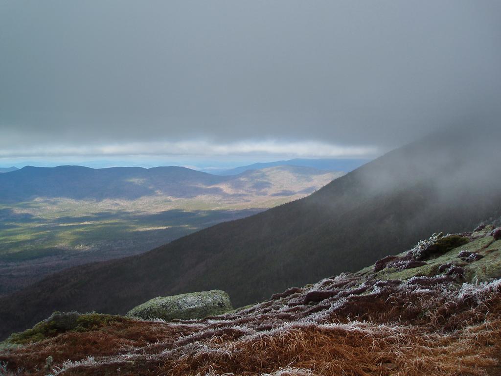 hiking up into the clouds in November on the way to Mount Eisenhower in the White Mountains of New Hampshire