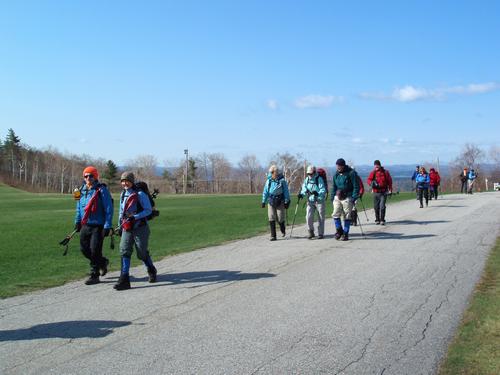 hikers on the access road to Faraway Mountain in New Hampshire