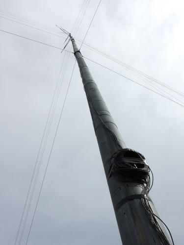 wind monitoring tower atop Forbes Mountain near Newfound Lake in New Hampshire