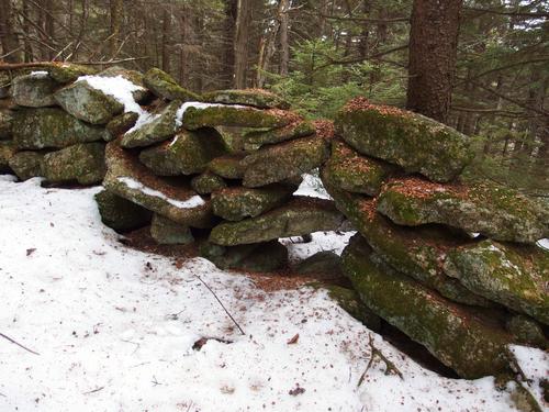 rock wall on a bushwhack to Goves Mountain in New Hampshire