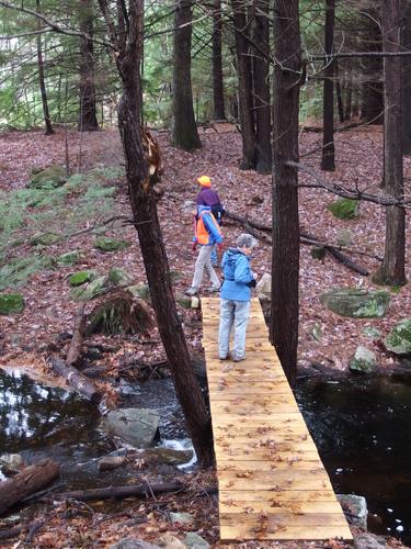 stream crossing within Grater Woods at Merrimack in southern New Hampshire