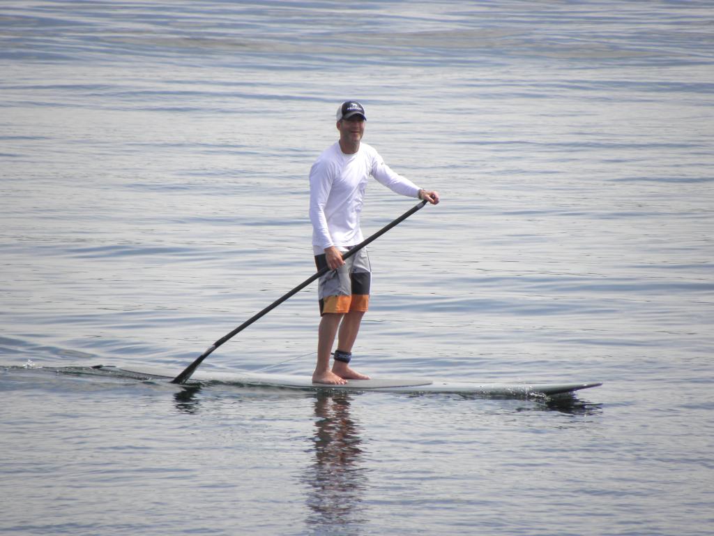 paddler in June at Great Island Common in New Hampshire