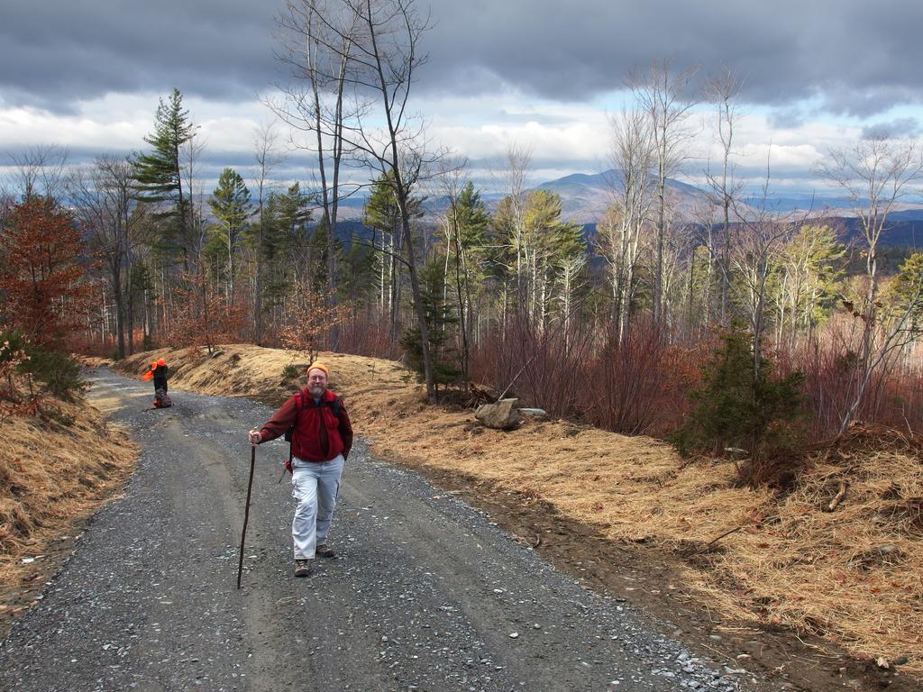 John and Dick head up the tower access road in December to Green Mountain in Claremont, NH