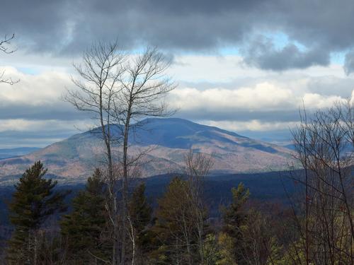 John and Dick head up the tower access road in December to Green Mountain in Claremont, NH