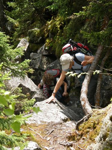 hikers climbing Ice Gulch in New Hampshire