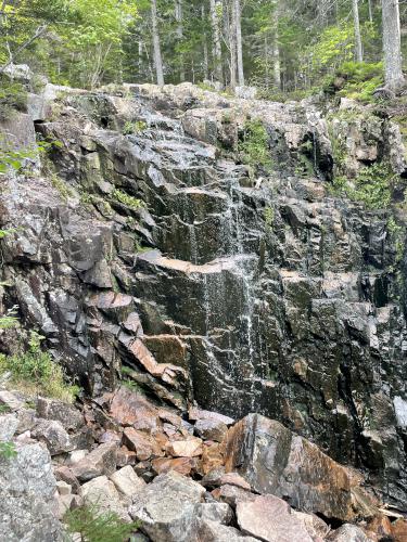 waterfall in September upstream from the Waterfall Bridge at Acadia National Park in Maine