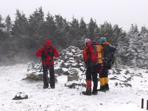 winter hikers at the summit of Mount Hale in New Hampshire