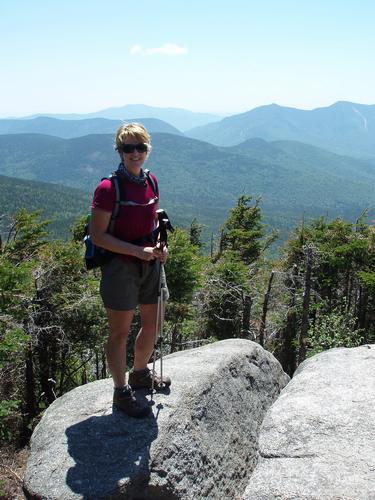 hiker at the lookout on Mount Hancock in New Hampshire