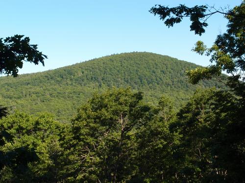 view of Avery Ledge from the summit of Haystack Mountain in New Hampshire