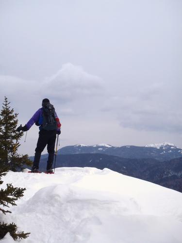 hiker at the lookout on Hedgehog Mountain in New Hampshire