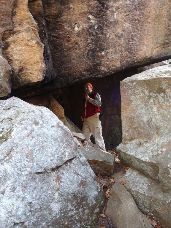 John stands inside the Stonehouse at Hobart-Fessenden Woods in Brookline, New Hampshire