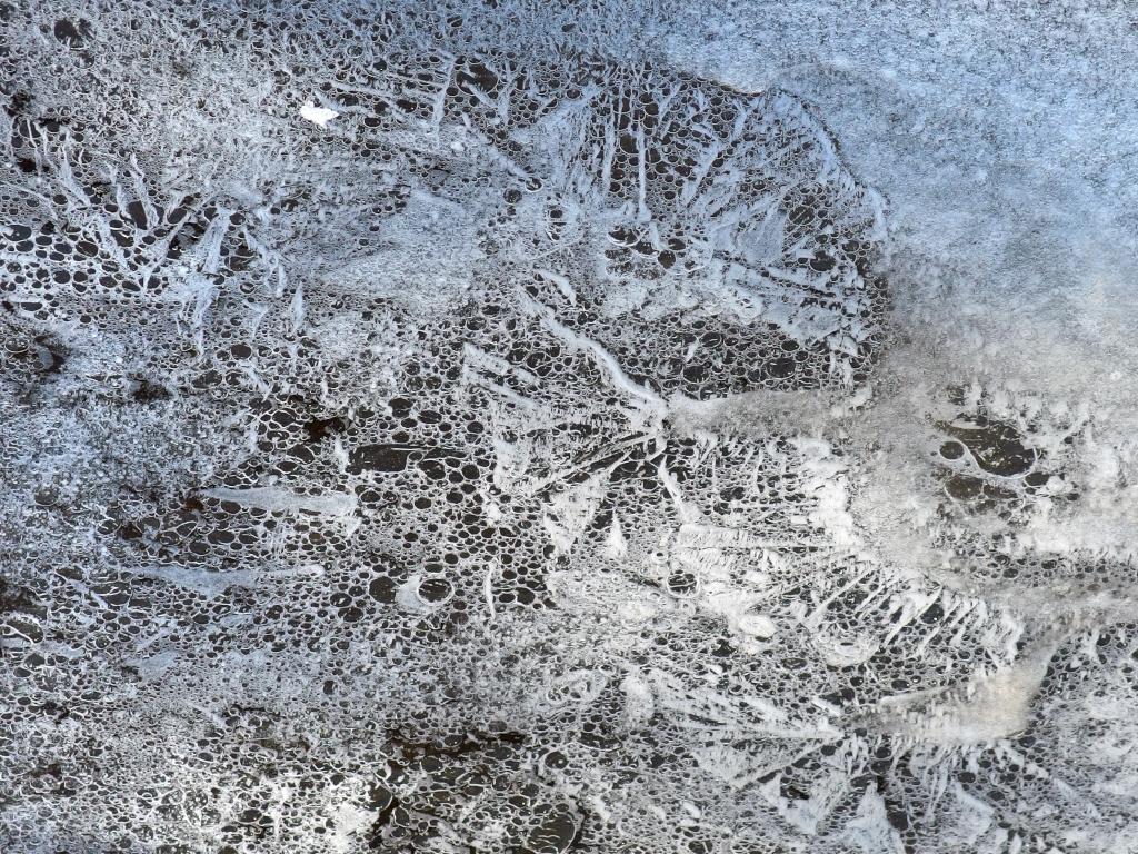 water-bubble ice pattern in March on Burnham Brook at Hutchins Forest in New Hampshire