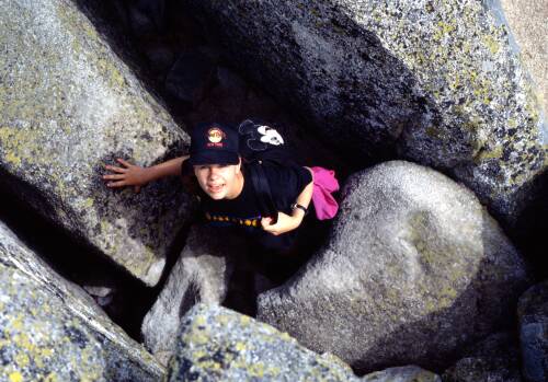 hiker headed up the Knife Edge trail on Mount Katahdin in Maine