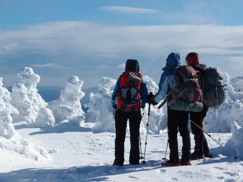 winter hikers on South Kinsman Mountain in New Hampshire