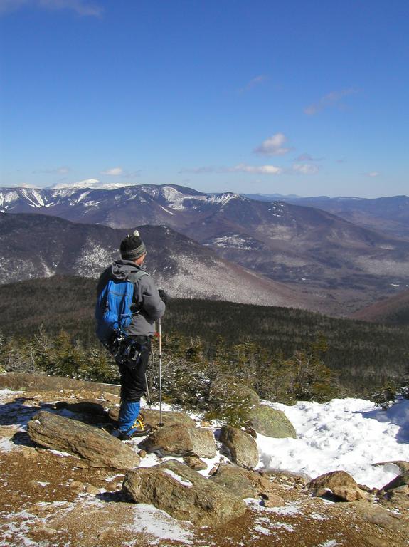 Dick takes in the summit view in March from Mount Liberty in New Hampshire