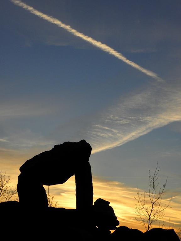 cairn and sunset as seen from Rose Mountain in New Hampshire