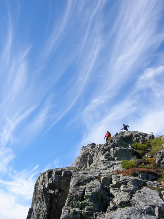 hikers coming off Peak of the Ridges on The Traveler mountain in Maine